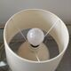 Pair of cracked white Kostka lamps