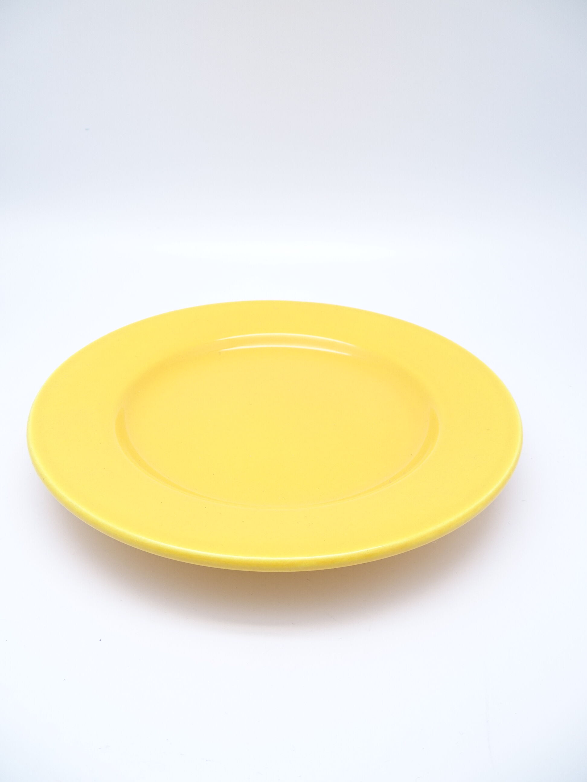 Set of 2 yellow ceramic plates