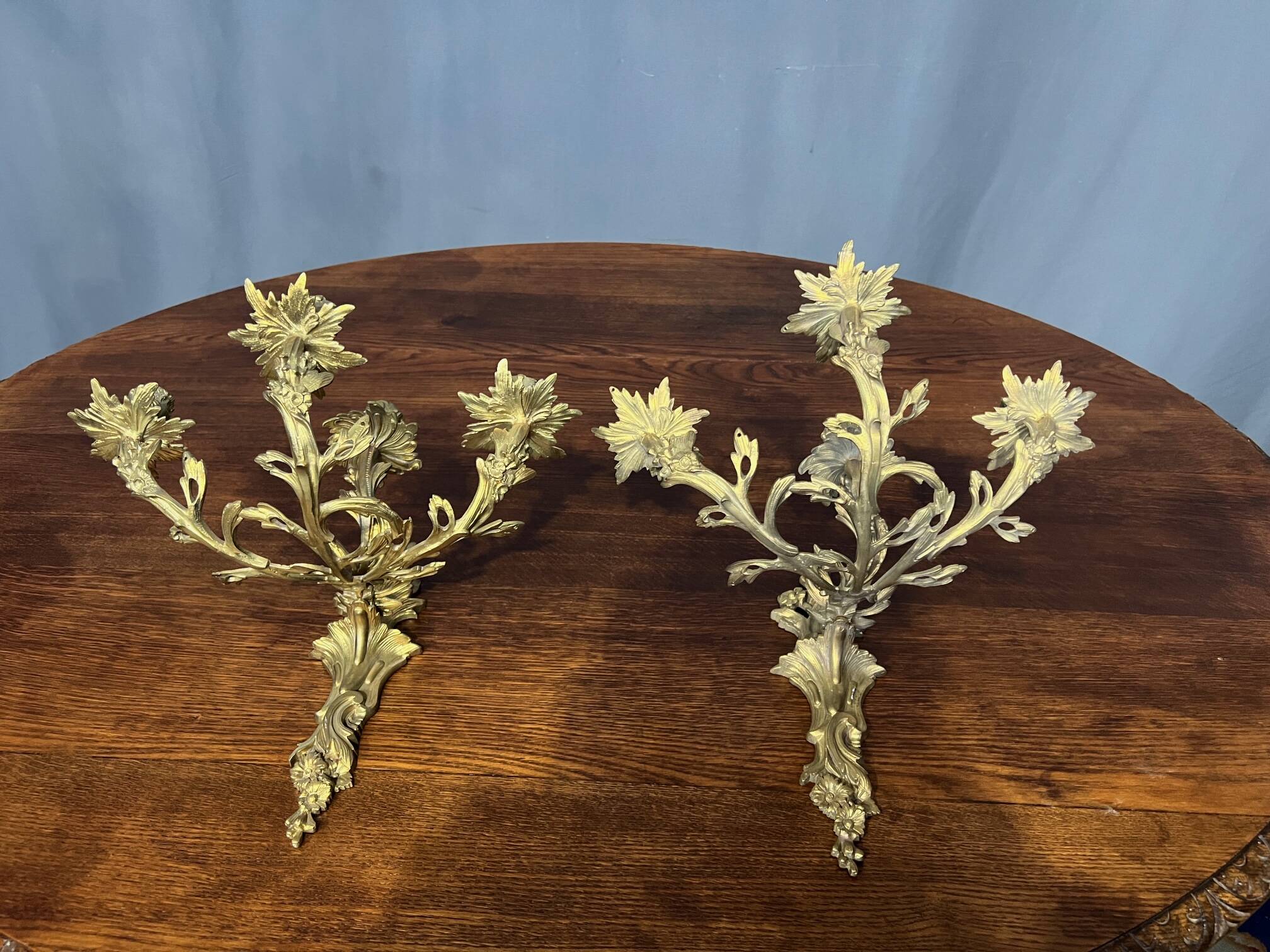 Rococo style wall candle holders. Solid gilded bronze.