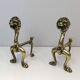 Pair of bronze andirons with lions