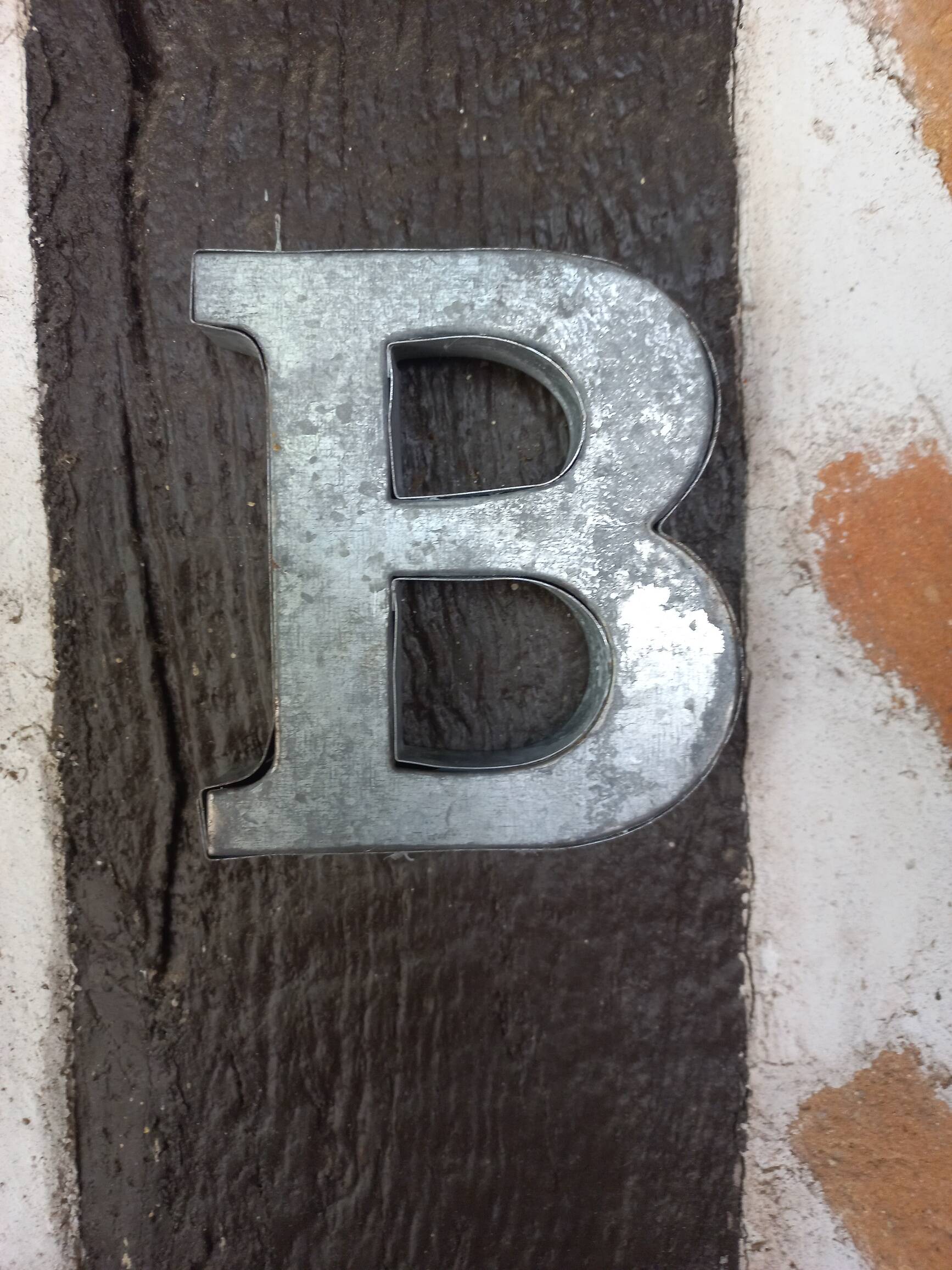 Letter B in zinc