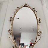 Oval mirror in gilded brass and floral horn, 1950s