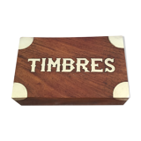 Small cabinet in walnut and brass