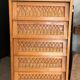 Vintage 1960s chest of drawers / chiffonnier with tapered legs and rattan.