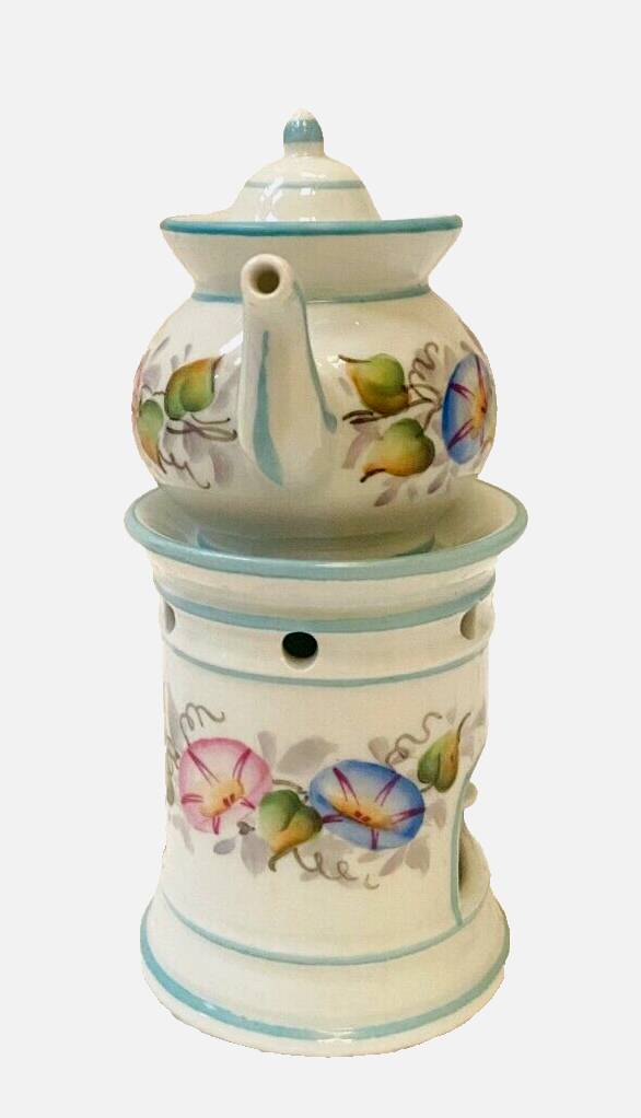 Polychrome porcelain tea pot with 20th century floral decoration