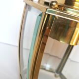 Golden hanging lamp with bevelled glasses