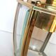 Golden hanging lamp with bevelled glasses