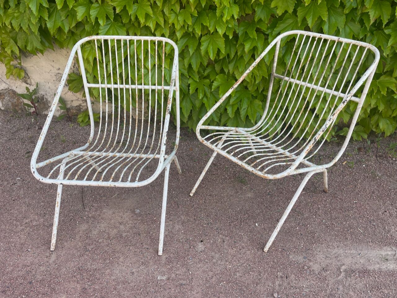 Pair of wrought iron armchairs year 60