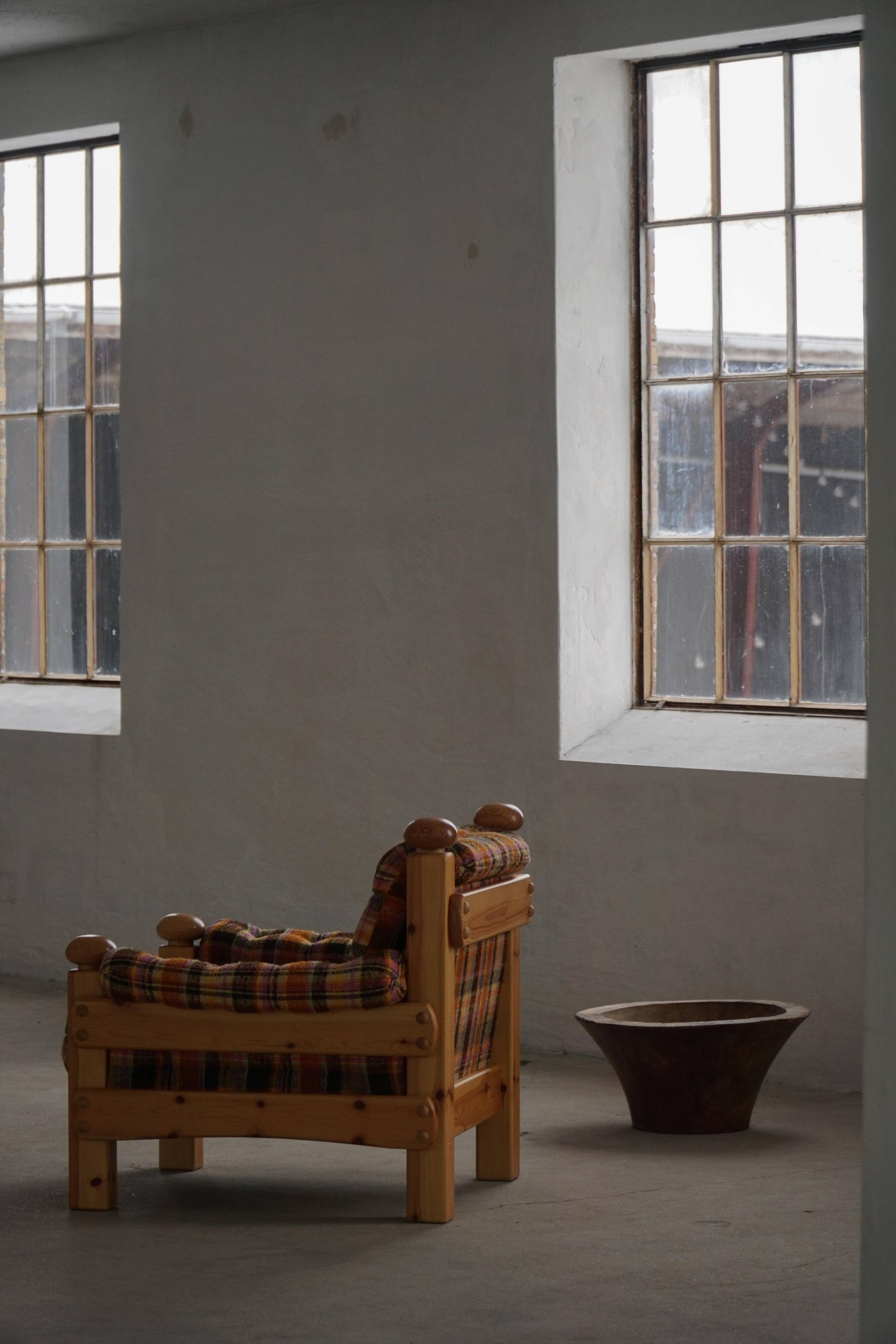 Brutalist lounge chair in solid pine, Swedish modern, made in the 1970s.