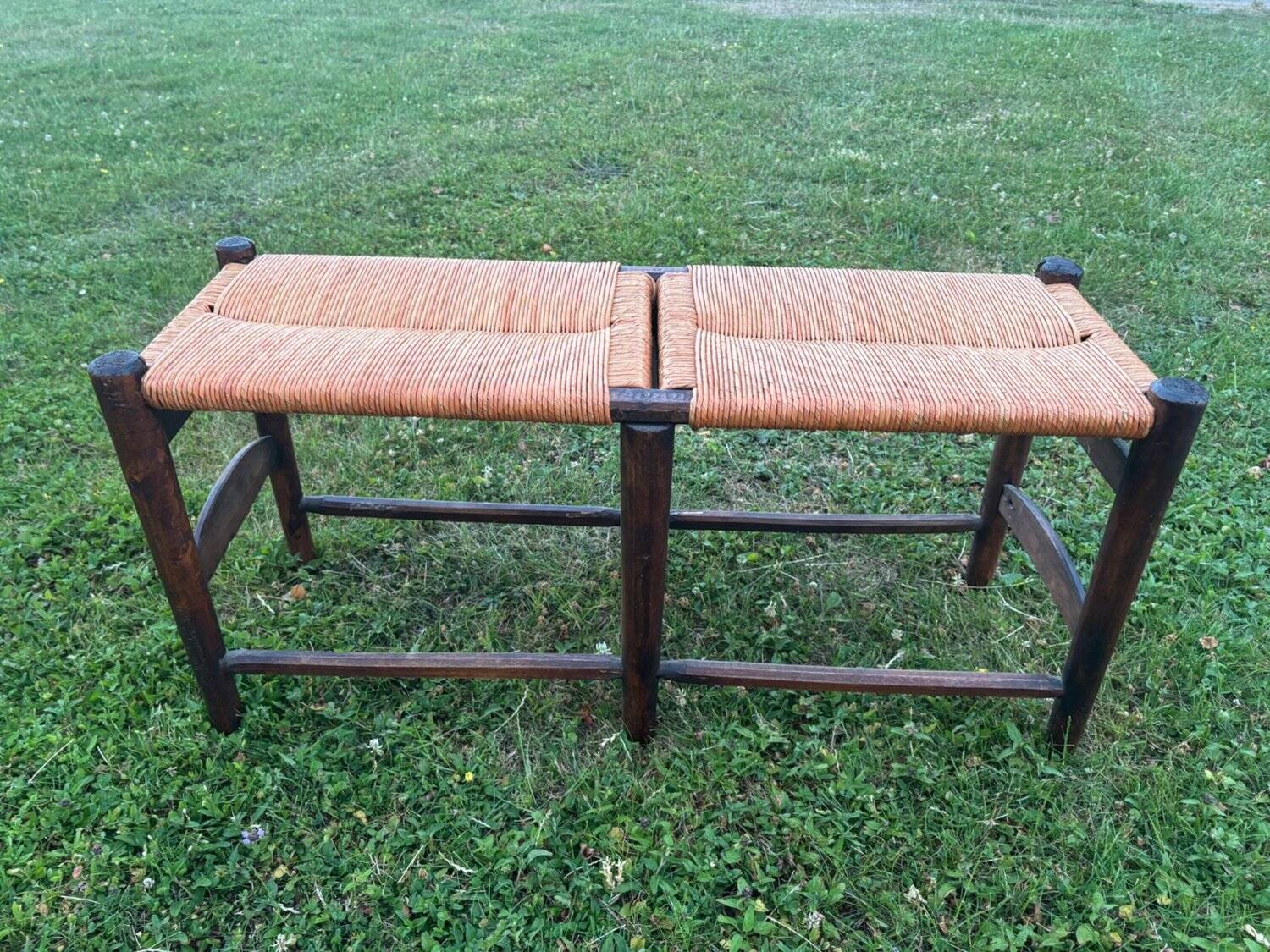 Two-seater straw bench, French rural style, wood and rush, early 20th century.