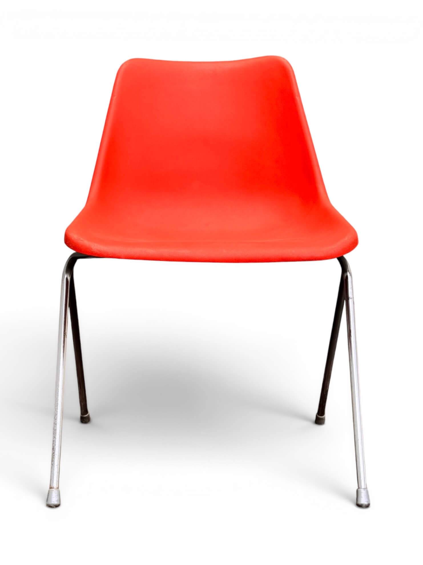 Set of 4 orange chairs designed by Robin Day for Hille.