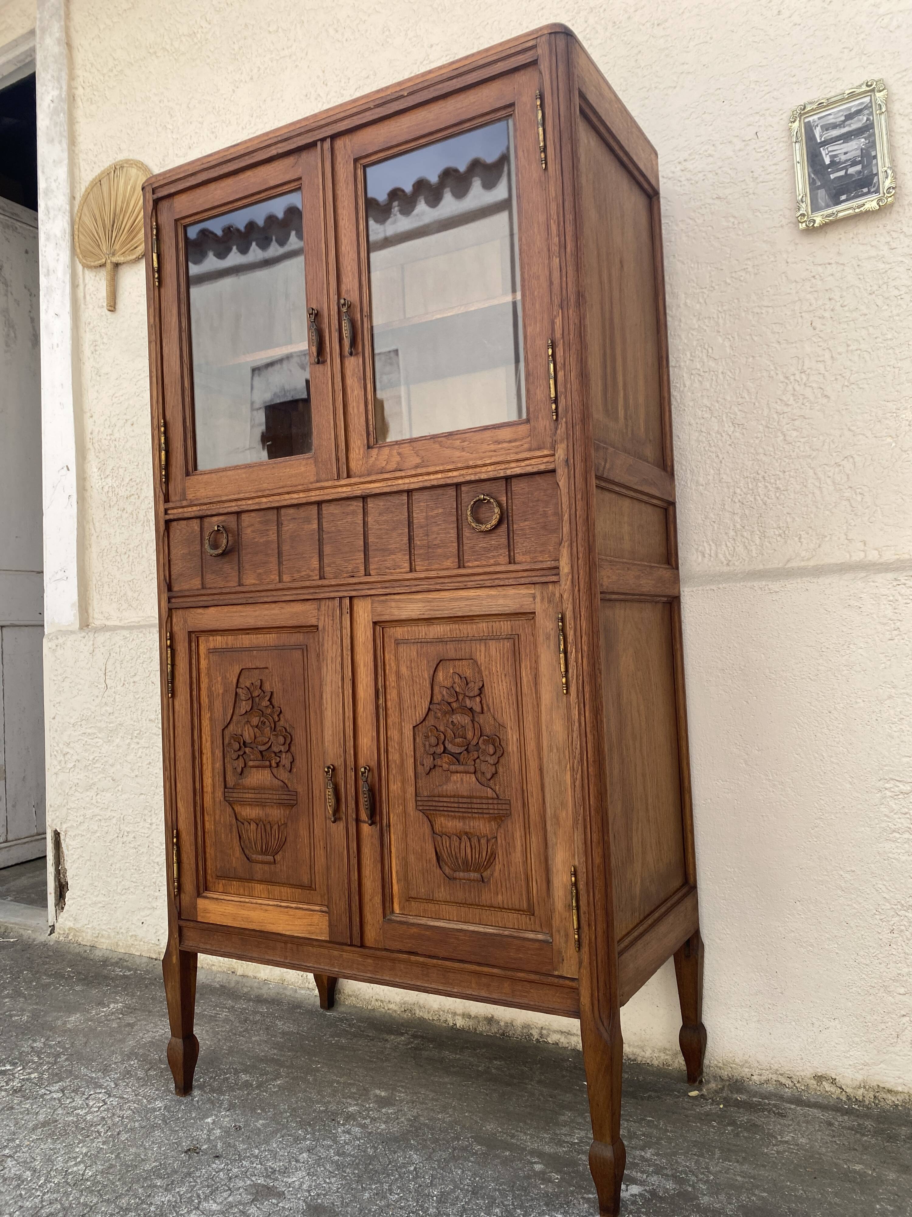 Old small glass display cabinet from the early 20th century.