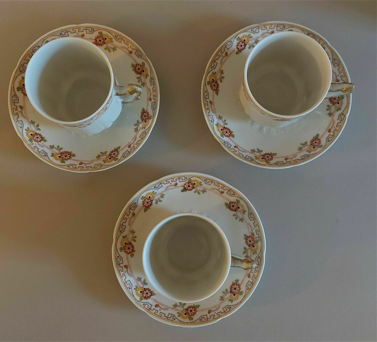 Porcelain cups UC Limoges, series of three