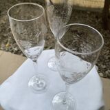 Set of 3 engraved champagne flutes.