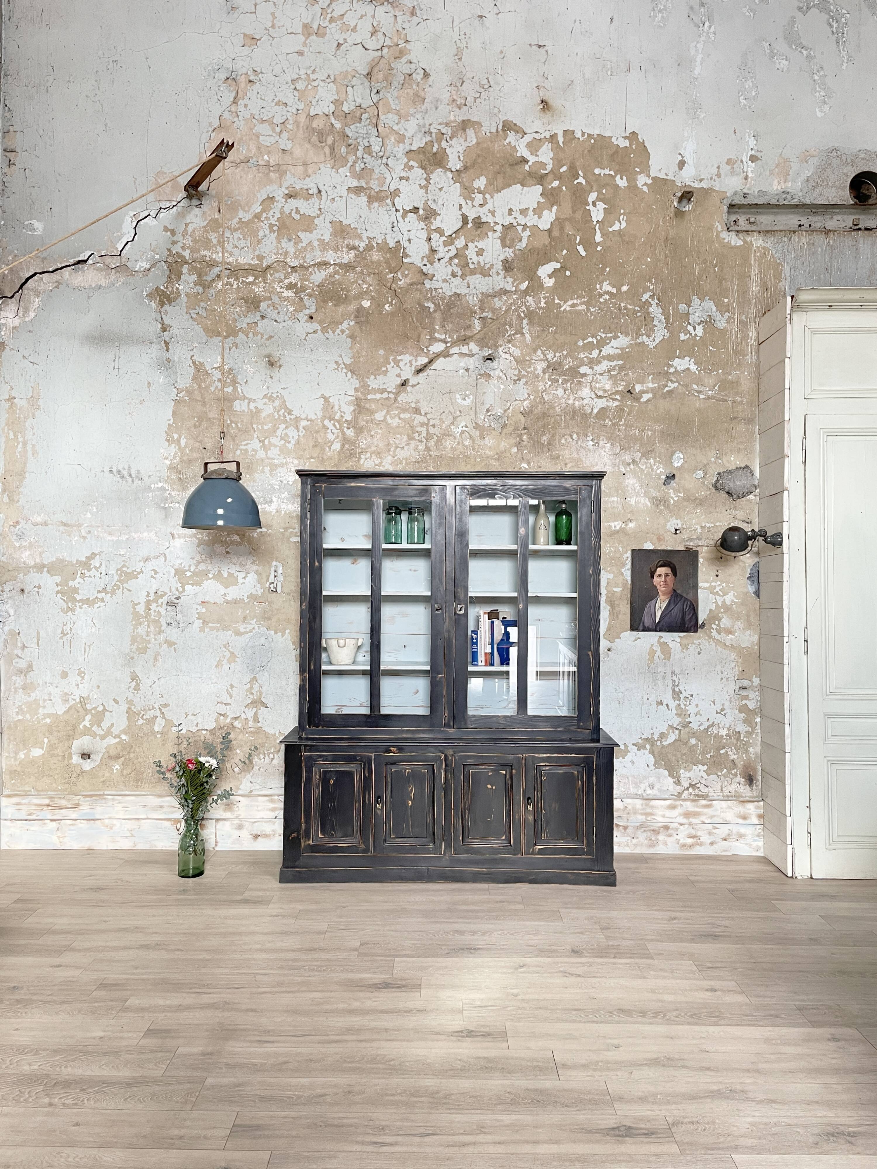 Display cabinet in patinated wood