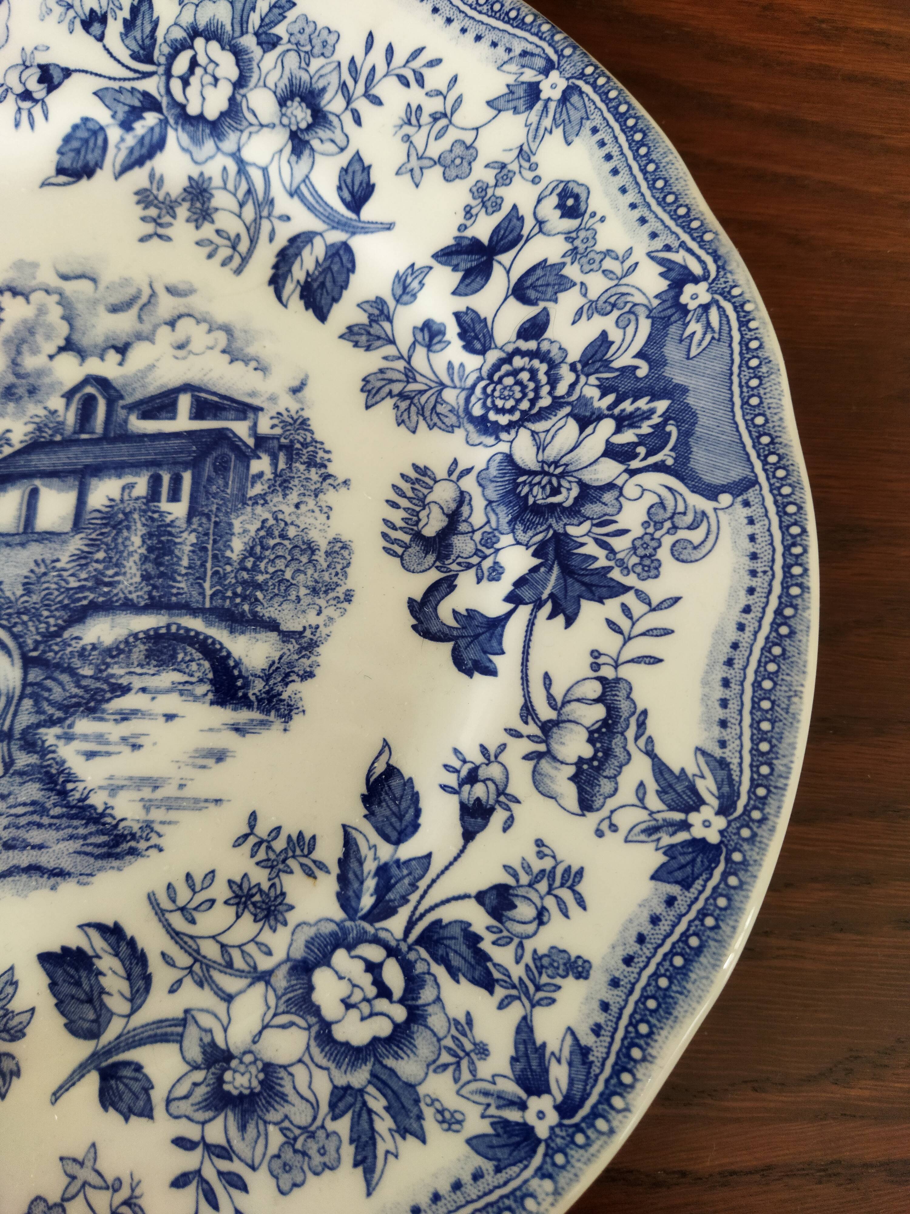 8 blue & white plates