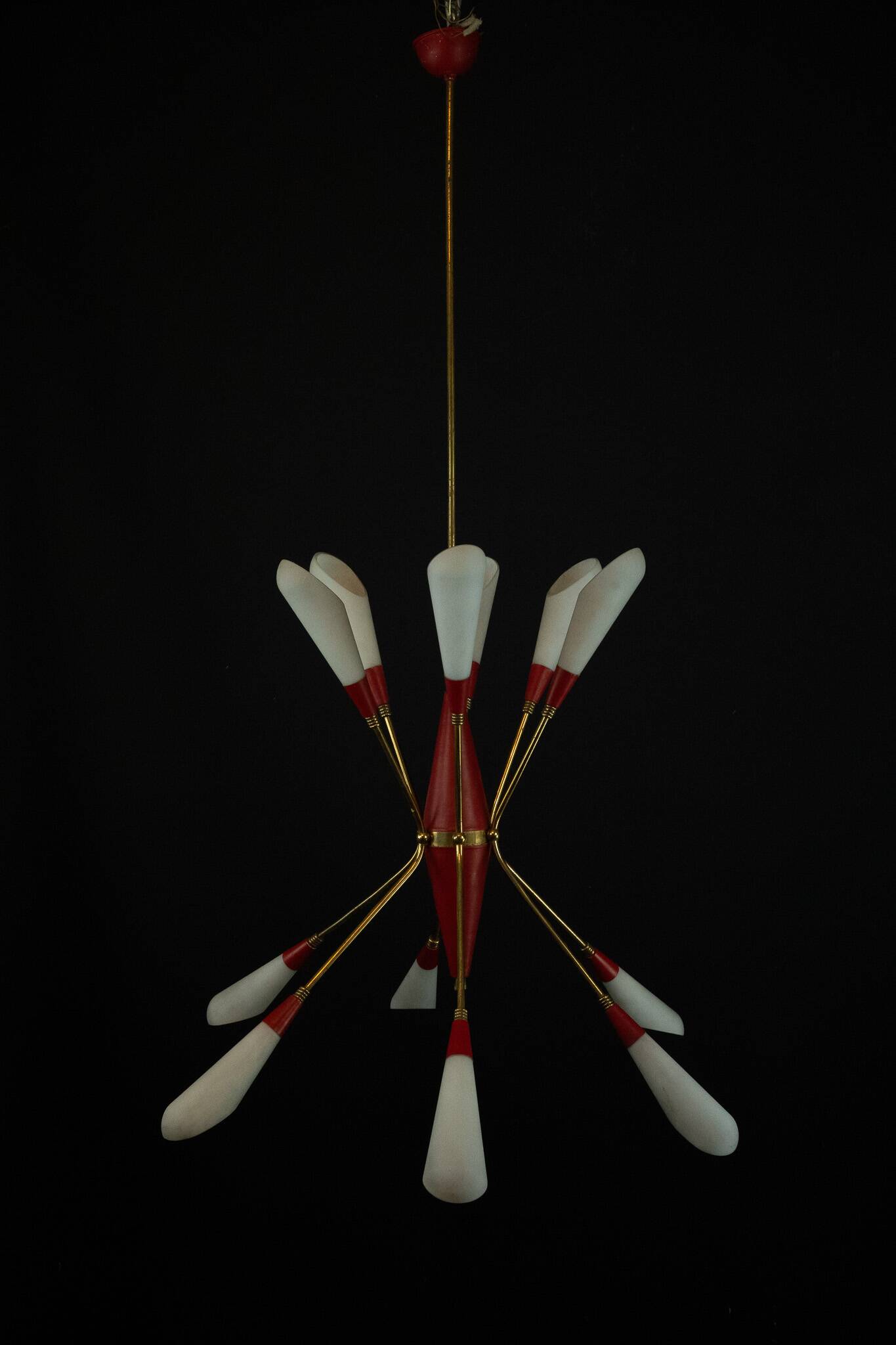 Mid-Century 12 lights chandelier in the manner of Stilnovo. Italy 1950s