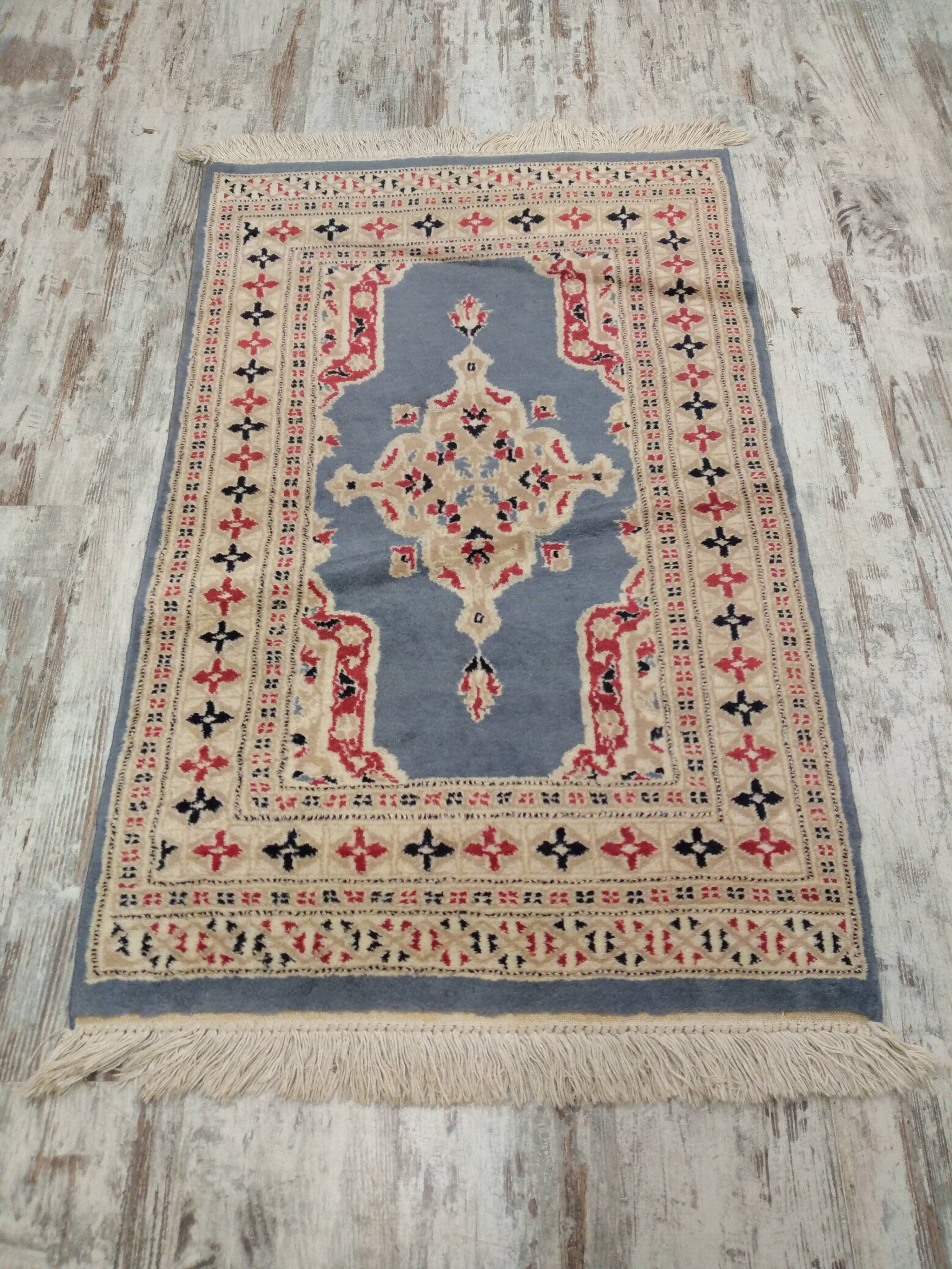 Handmade wool and silk Persian rug