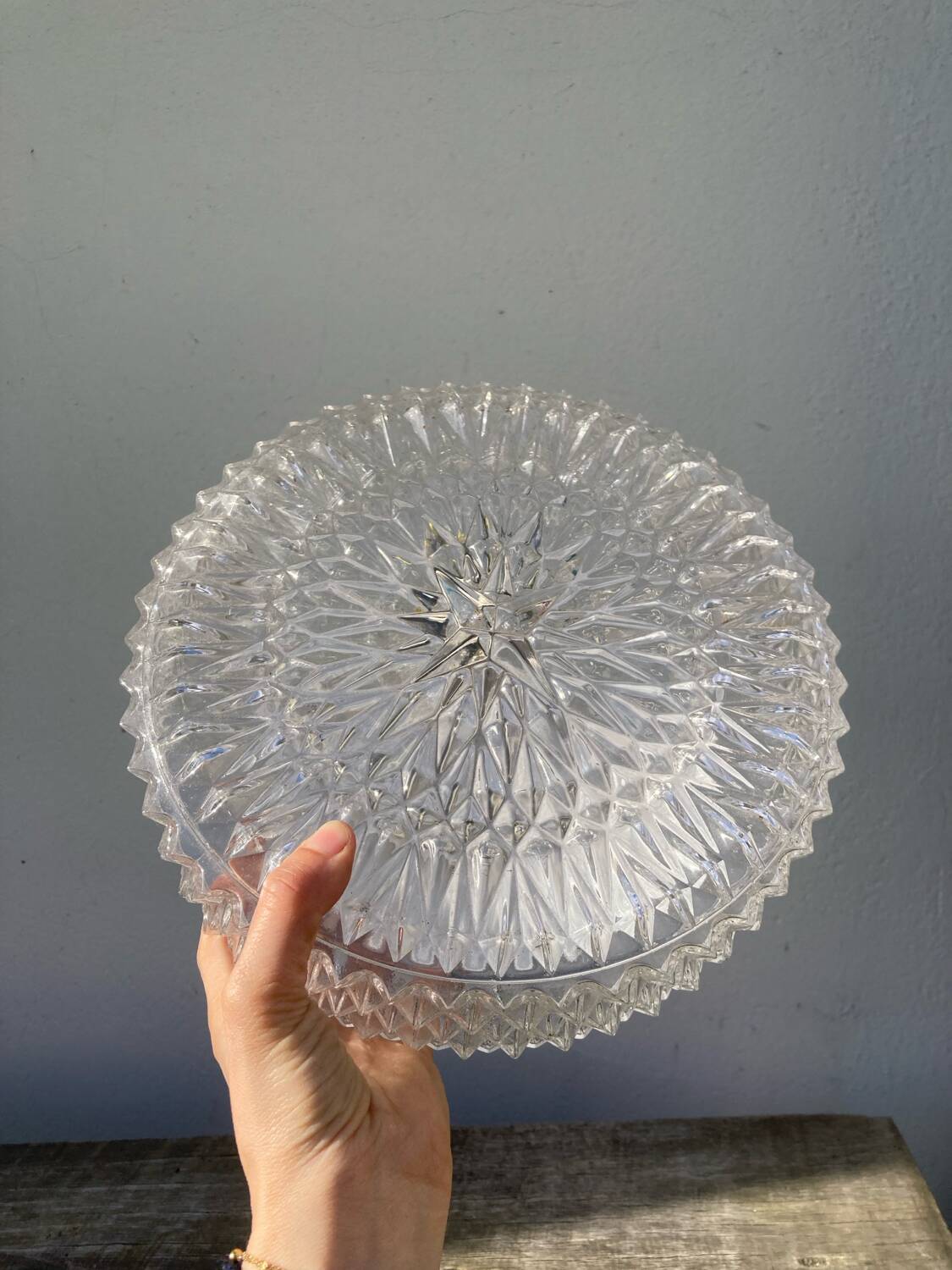 Pair of transparent round glass wall lights