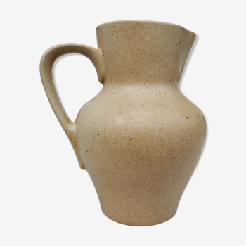 Beige ceramic pitcher