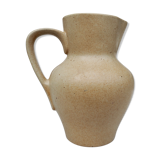 Beige ceramic pitcher