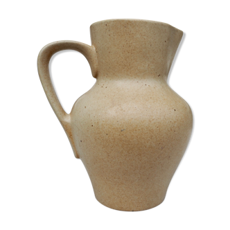 Beige ceramic pitcher