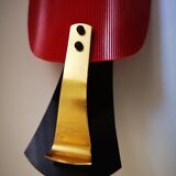 Red and black vintage sconce in fluted plastic and brass
