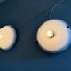 Pair of opal glass wall lights from the mid-century by Lamperti, 1960s, Italy.