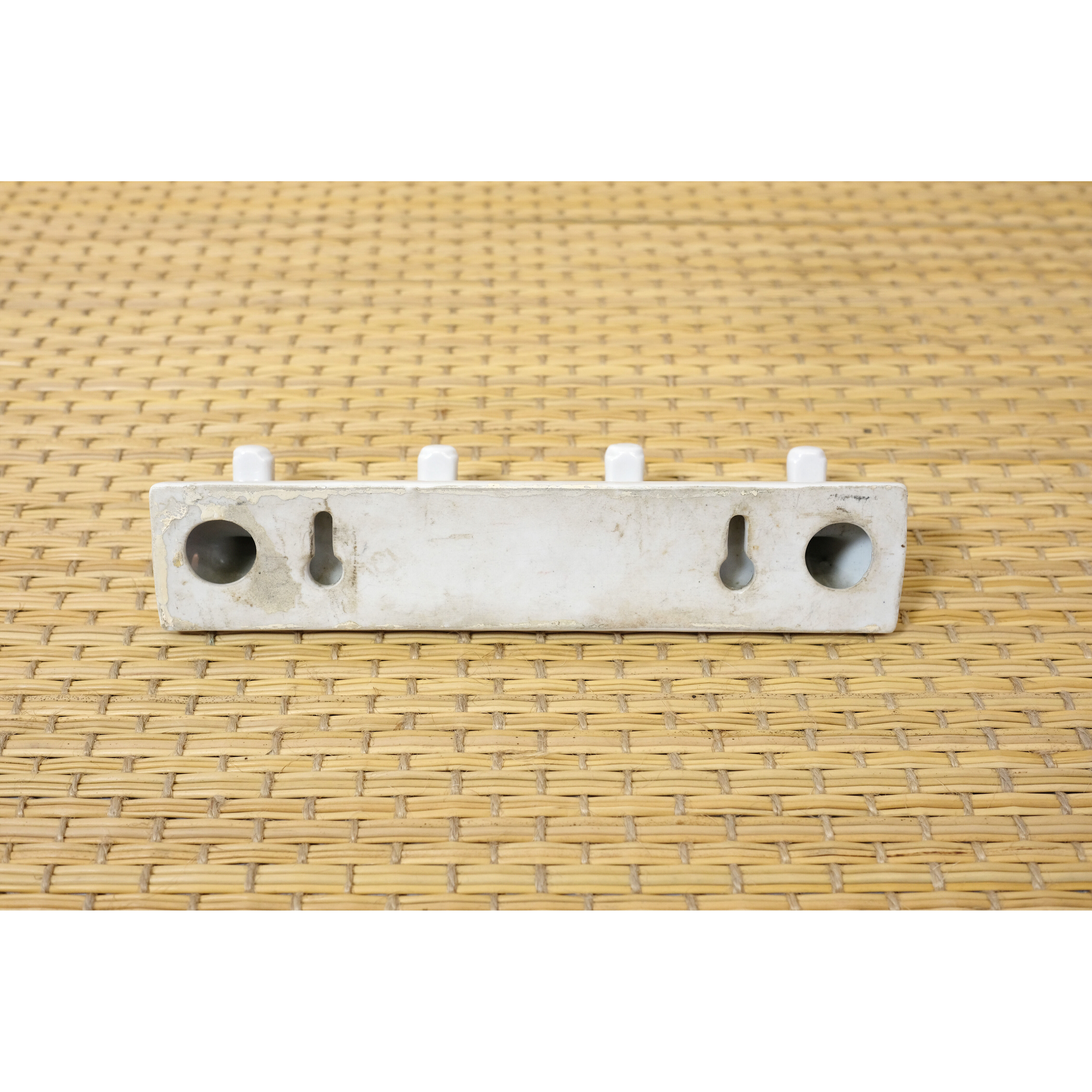 Tea towel holder or porcelain towel with 4 hooks.