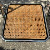 Pair of vintage metal caned folding chairs