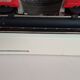 Typewriter "Burelec 315" made in Spain in red and white metal.
