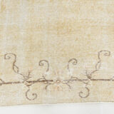 Faded beige classic vintage rug