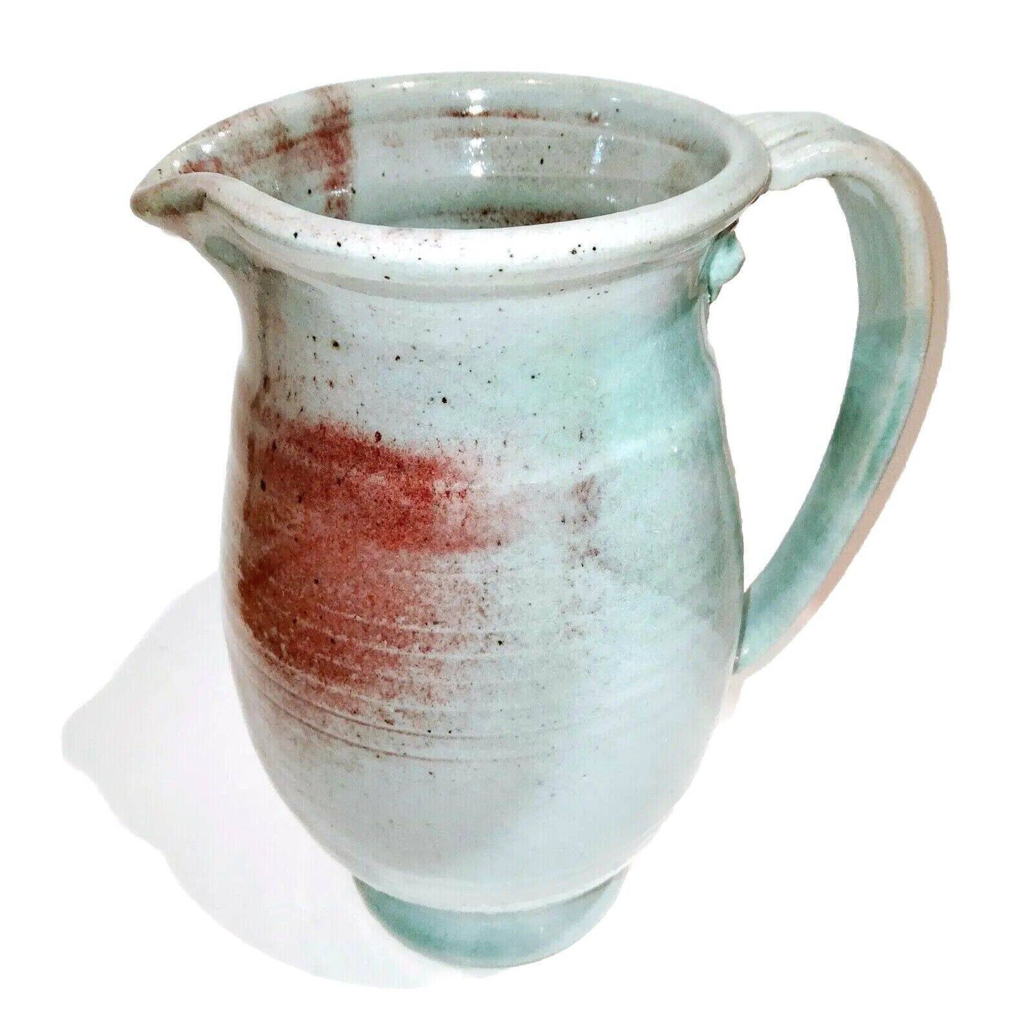Red and grey glazed stoneware pitcher Signed Height 21 cm