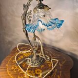 Bronze and brass lamp, transparent and blue glass shade.