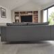 Three-seater grey mottled fabric sofa