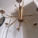 Gilded metal chandelier decorated with reeds and flowers