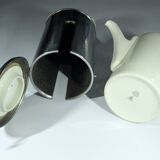 Art Deco porcelain coffee pot by SUS Bavaria with a metal warming hood by WMF, comes from the 1920s