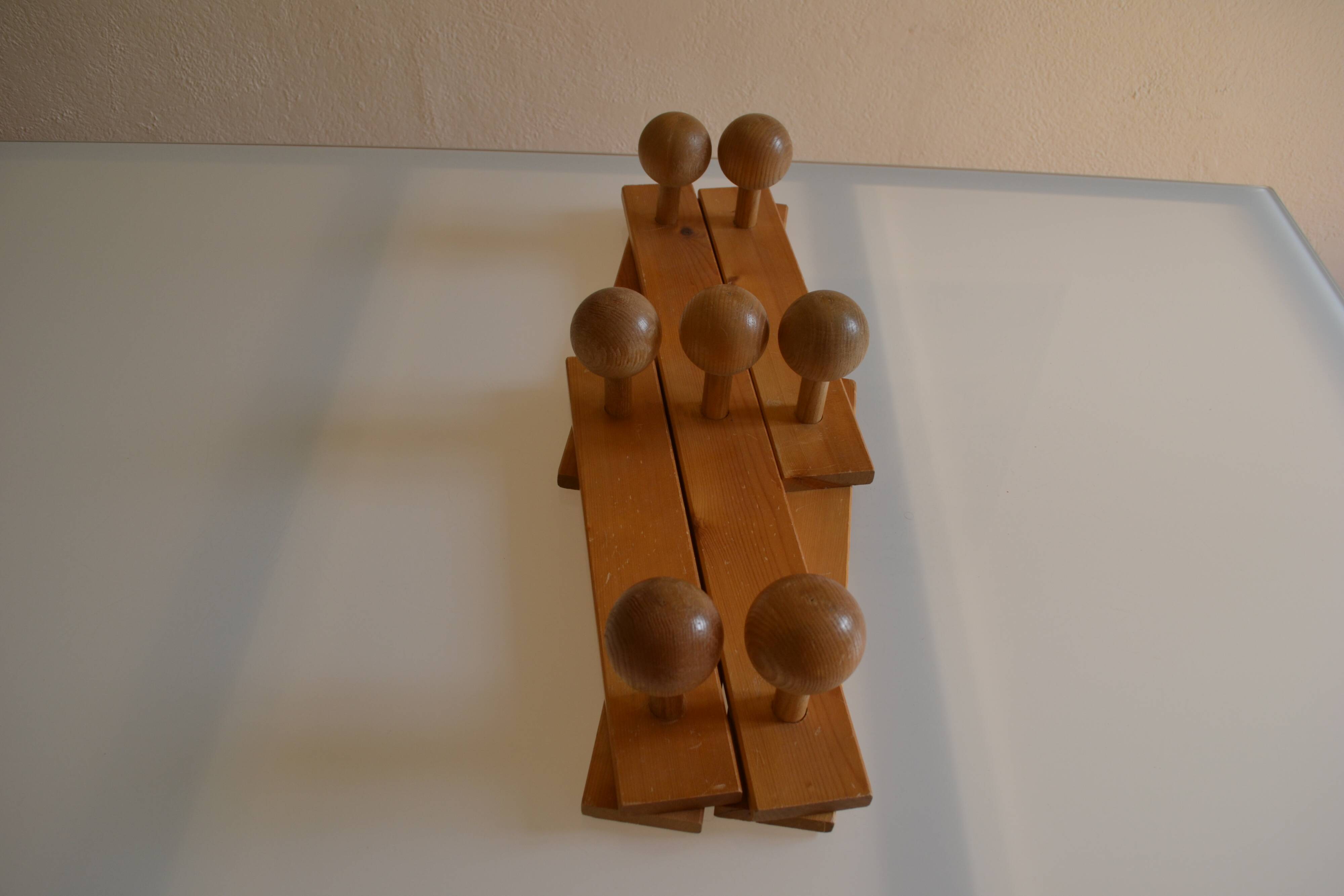 Brutalist wooden accordion wall coat rack with 7 hooks