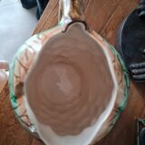 Pitcher in Slurry bunch of grapes