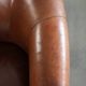 Vintage sheepskin club armchair in English style with deep colours