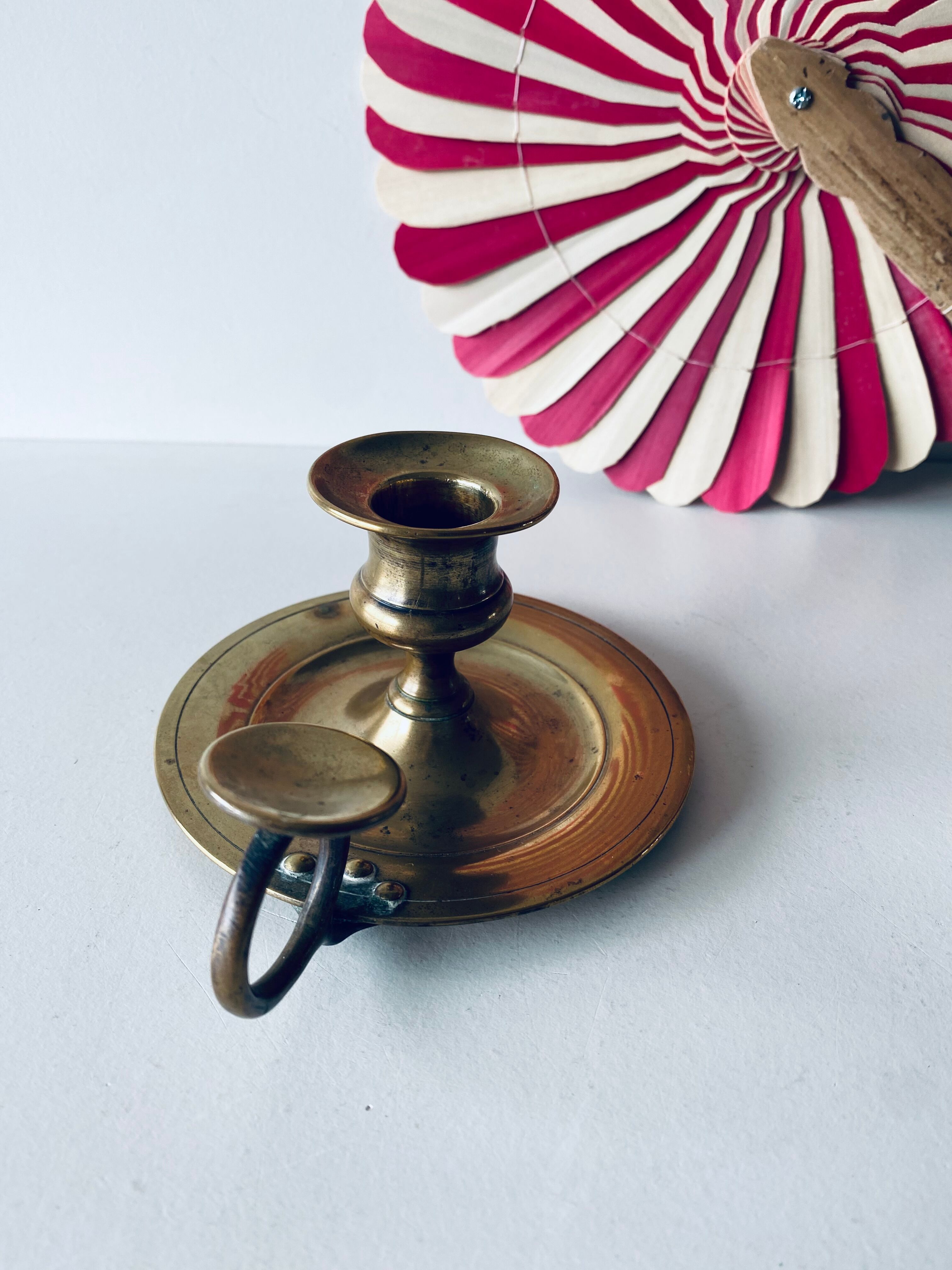 Old candle holder with handle