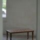 Vintage Indian teak coffee table inlaid with elephant motifs, mid-20th century.