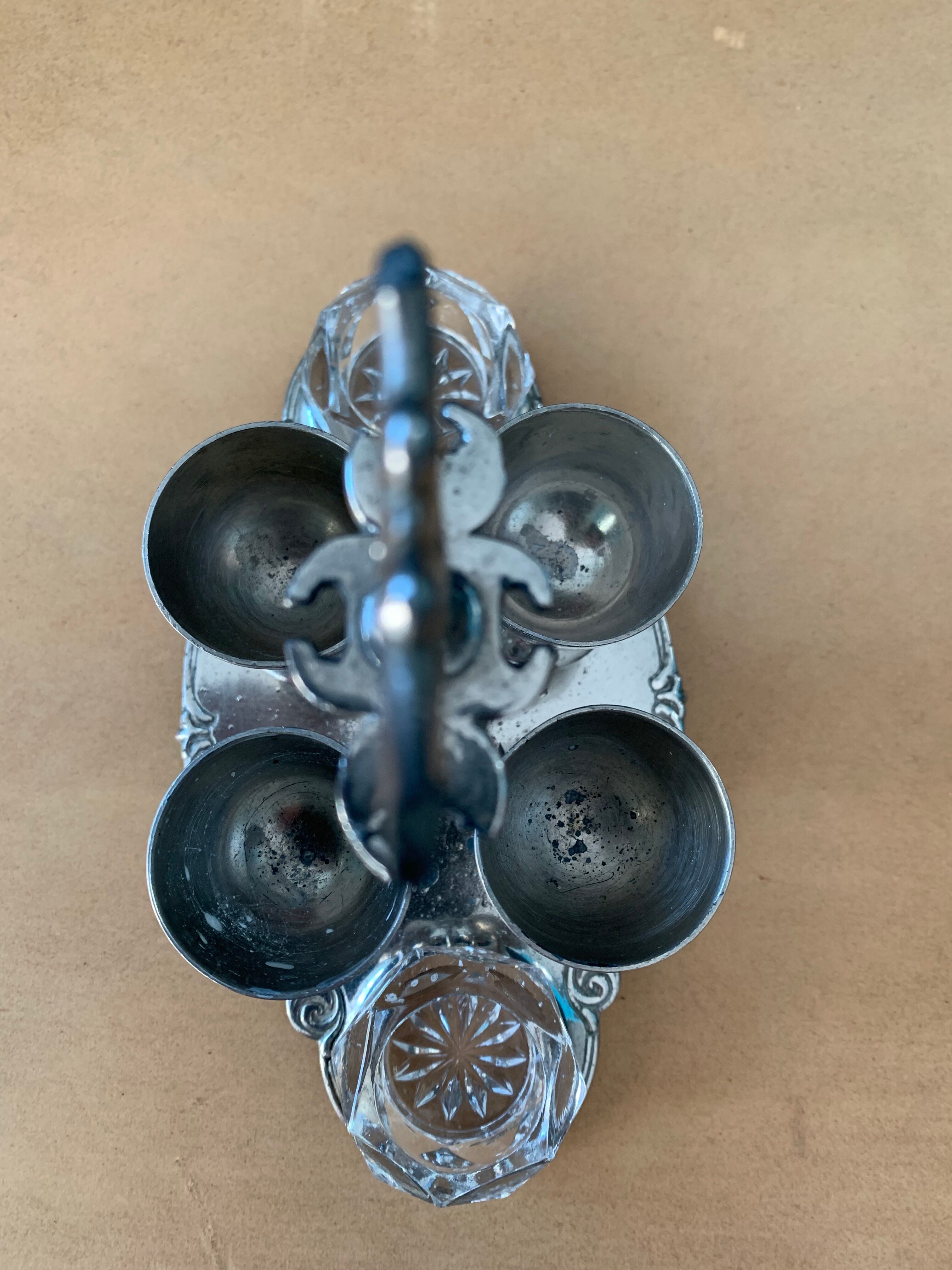 Old serving for boiled eggs with 4 metal cockroaches