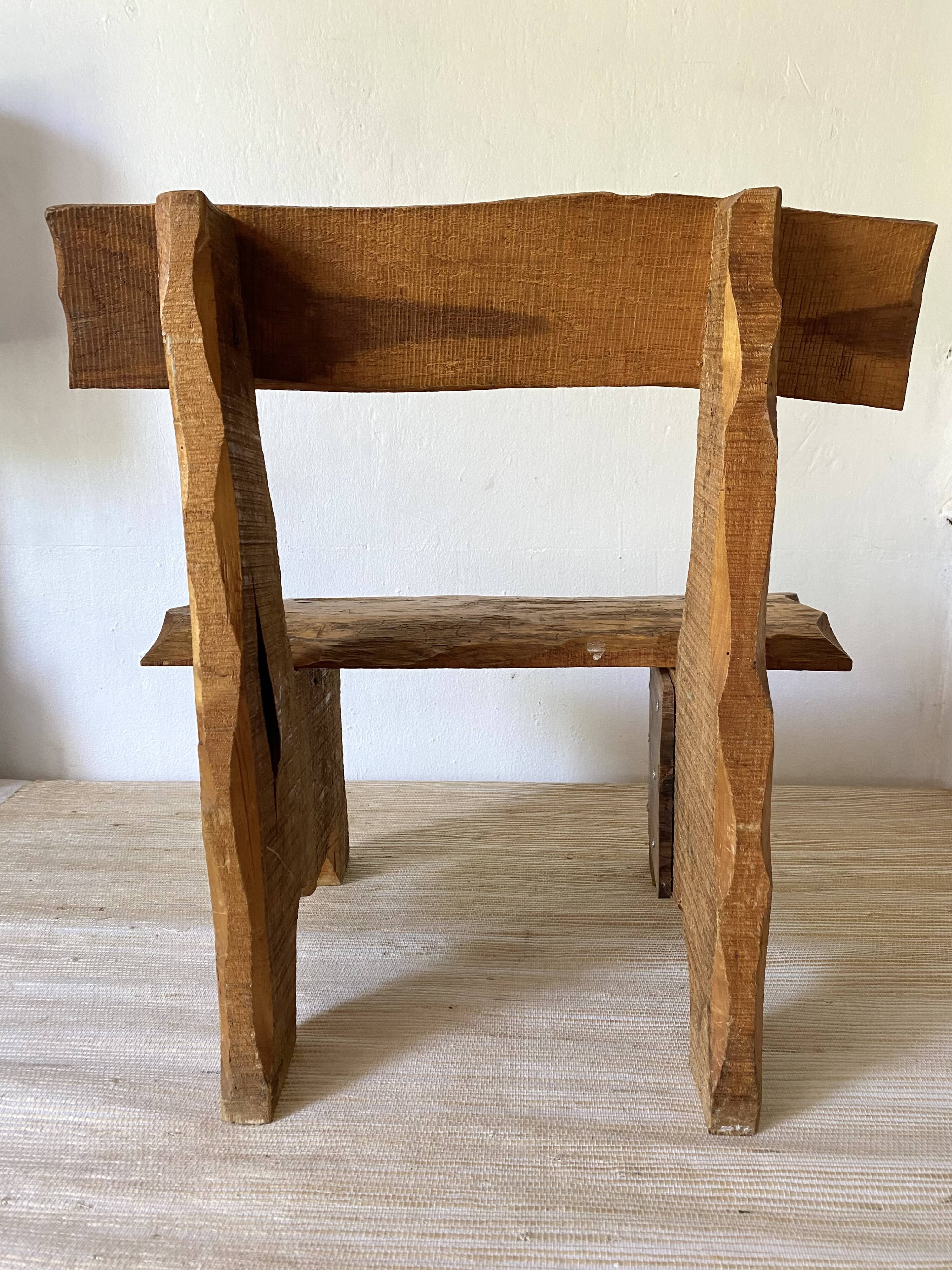 Brutalist low chair in solid wood