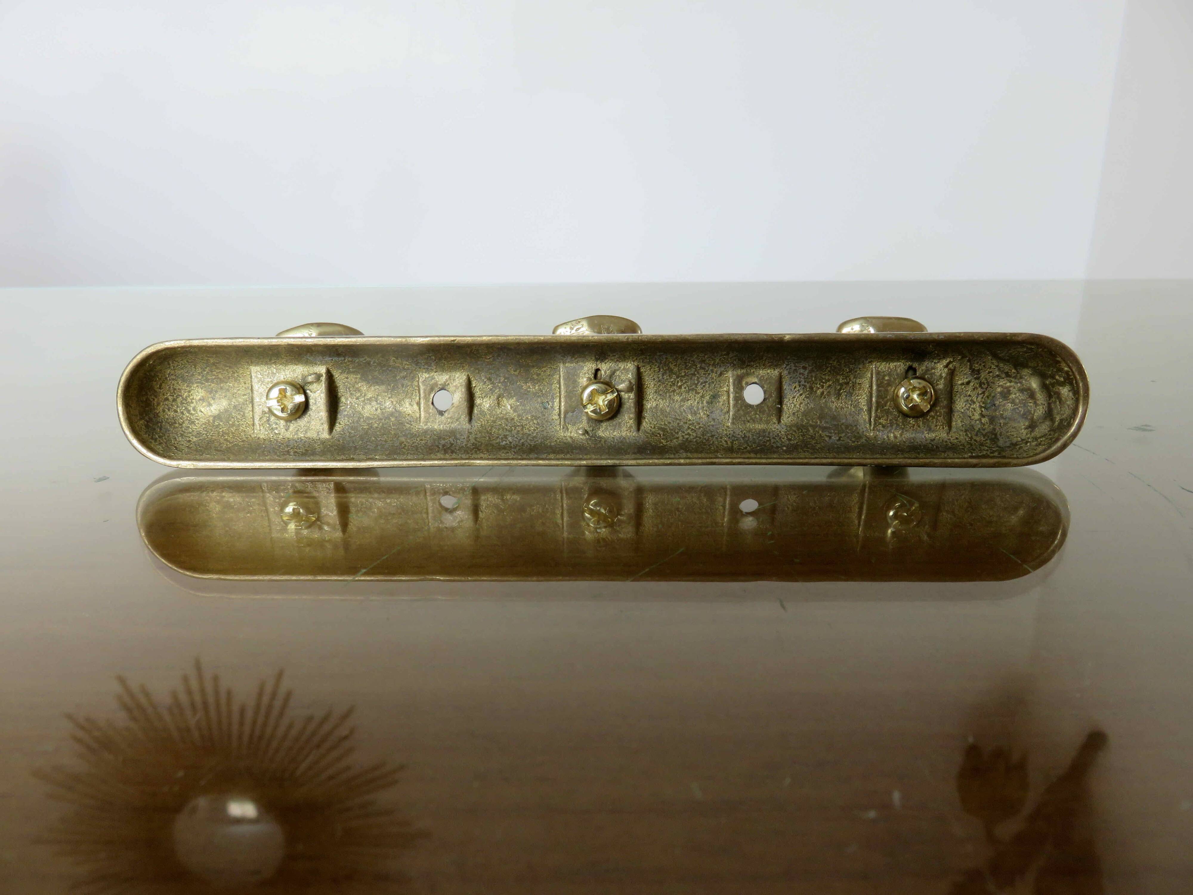 Brass tea towel holder