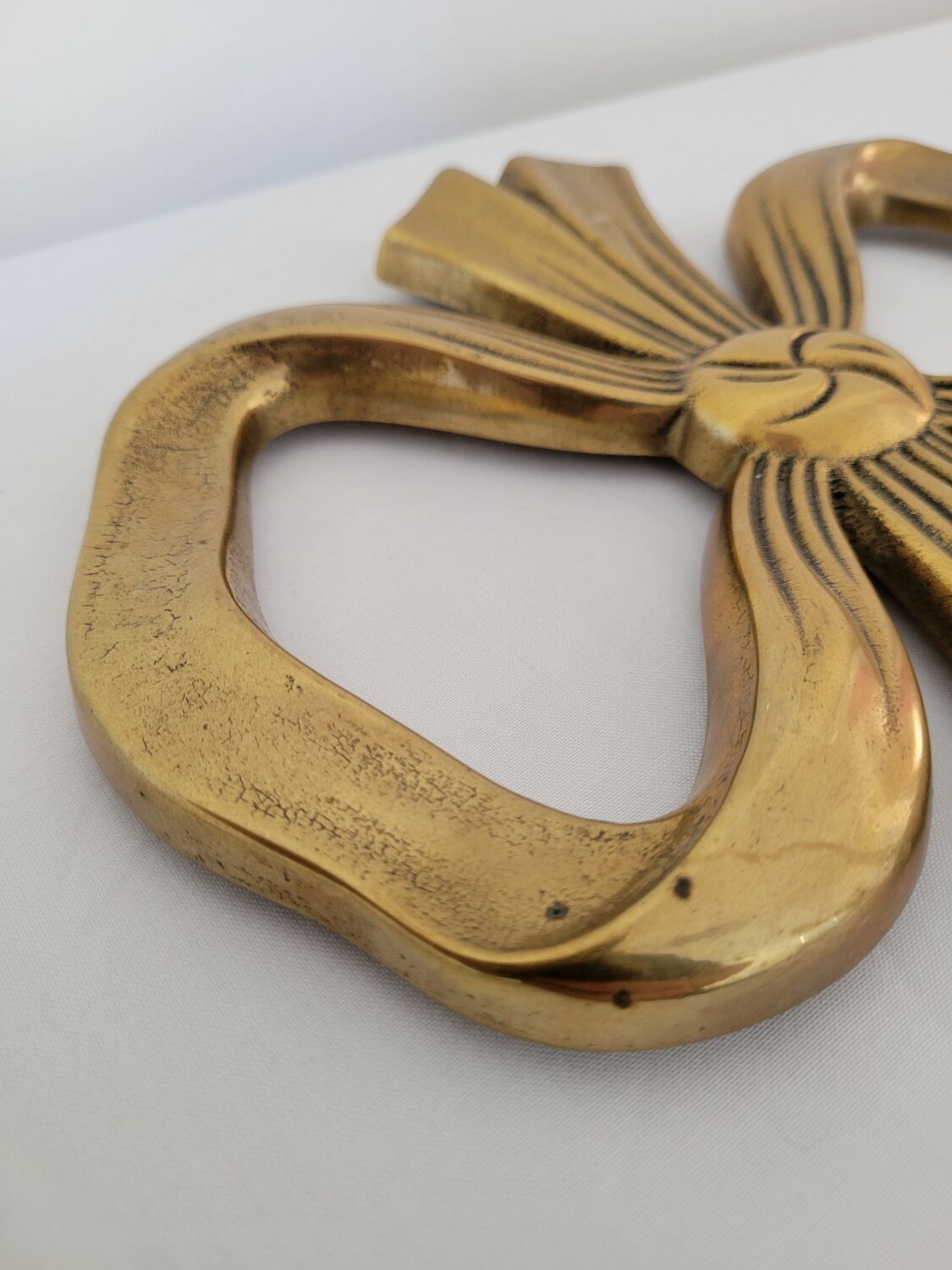 Brass ribbon bottom