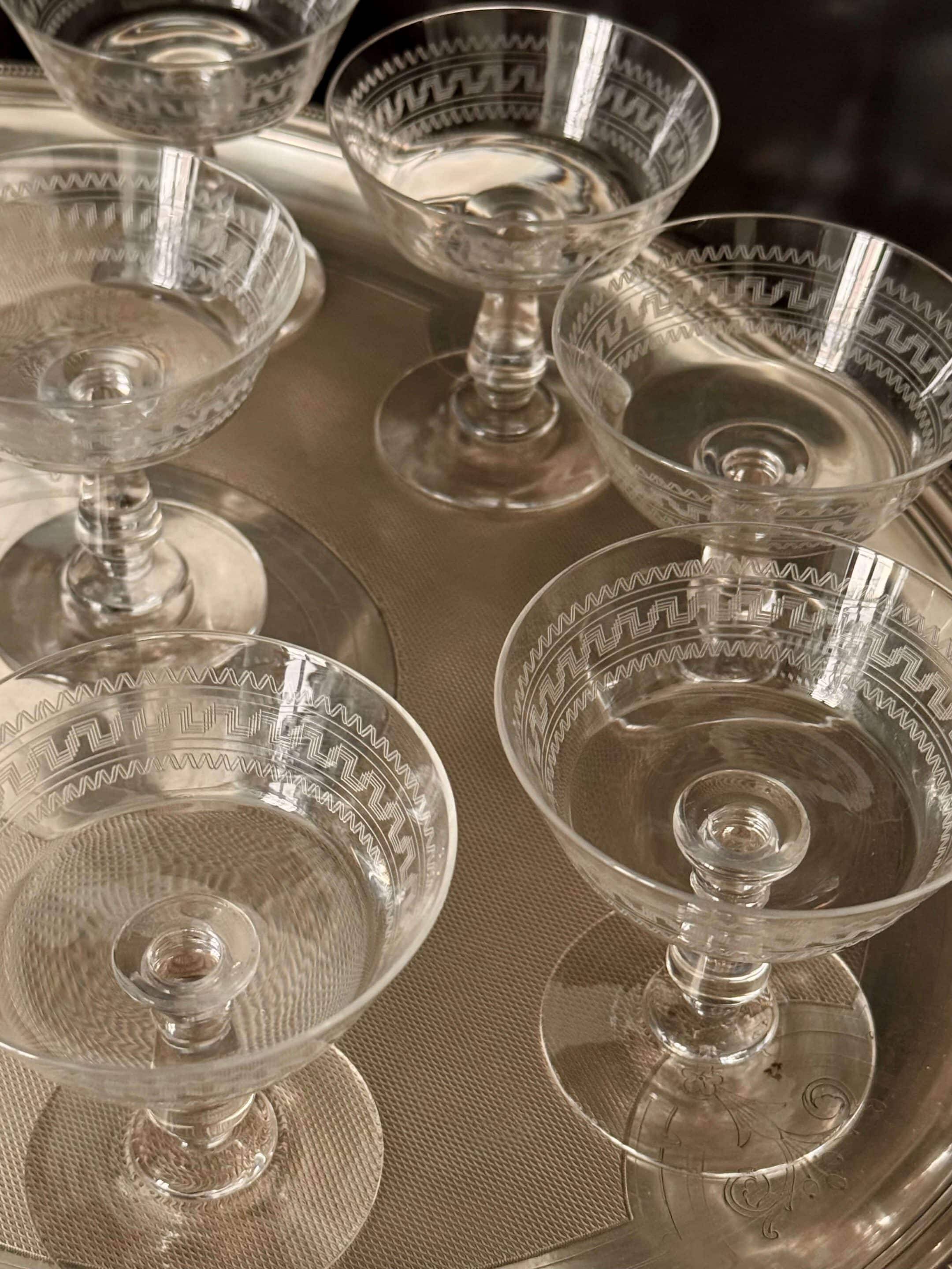 Baccarat, set of 10 engraved crystal champagne glasses from 1900.