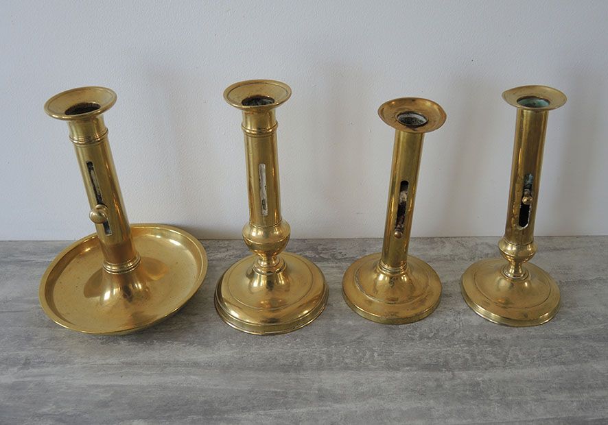 Set of 4 Old Brass Pusher Candle holders