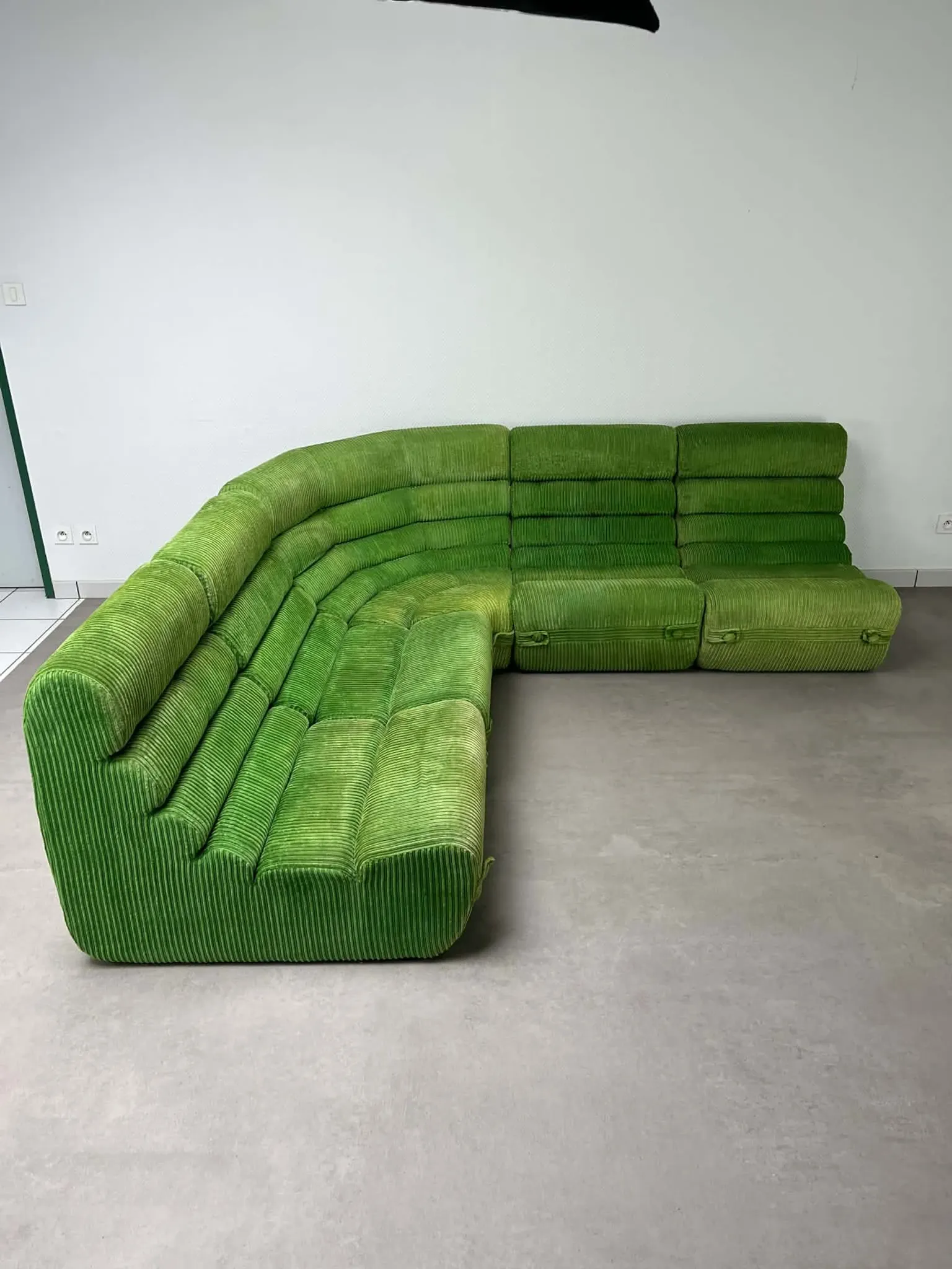 Modular green velvet corner sofa, 1970s