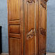 Louis XV style wardrobe with gendarme's hat in solid oak
